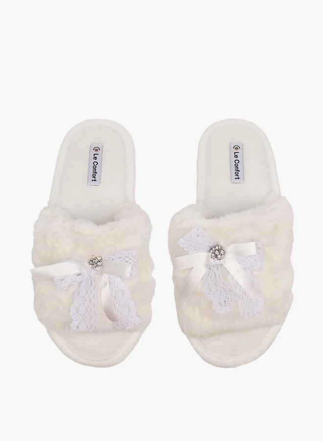 لو كونفورت شباشب منزلية بنسيج فرو صناعي وزينة فيونكة